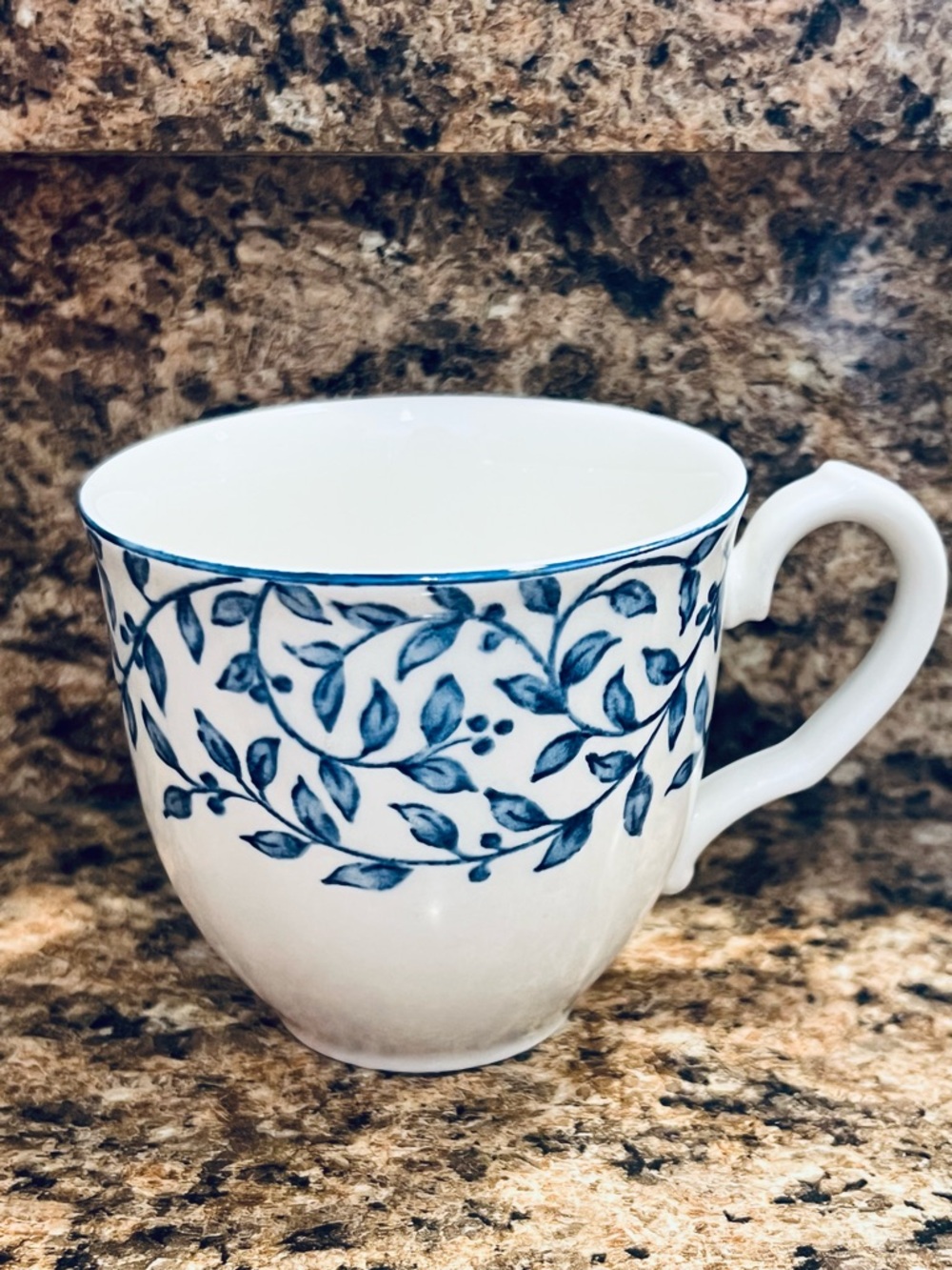 White Porcelain Teacup with Blue Vine Pattern